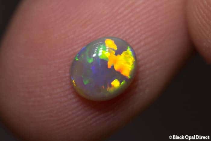 1.03 ct semi black opal 7x6x3mm