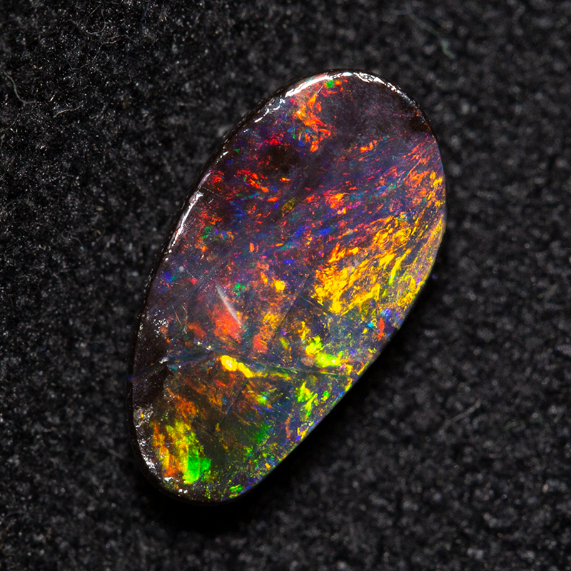 1.04 ct boulder opal 8.7x4.7x2.4mm