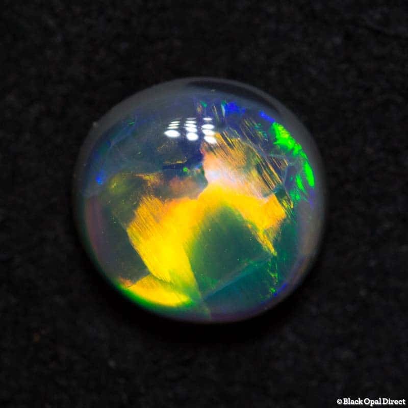 1.04 ct gem black opal 6.5mm round x3mm