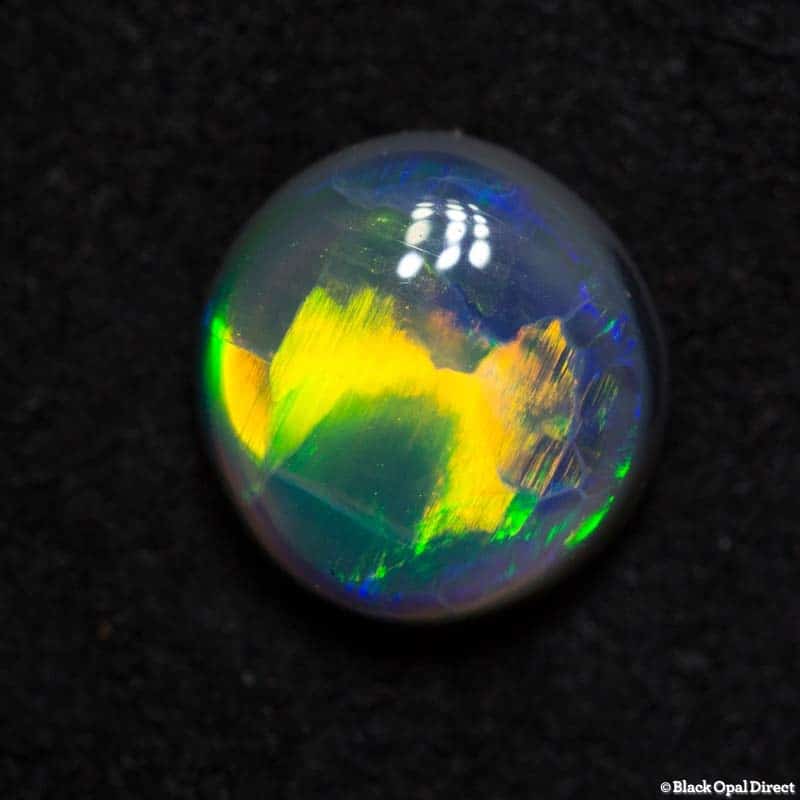1.04 ct gem black opal 6.5mm round x3mm