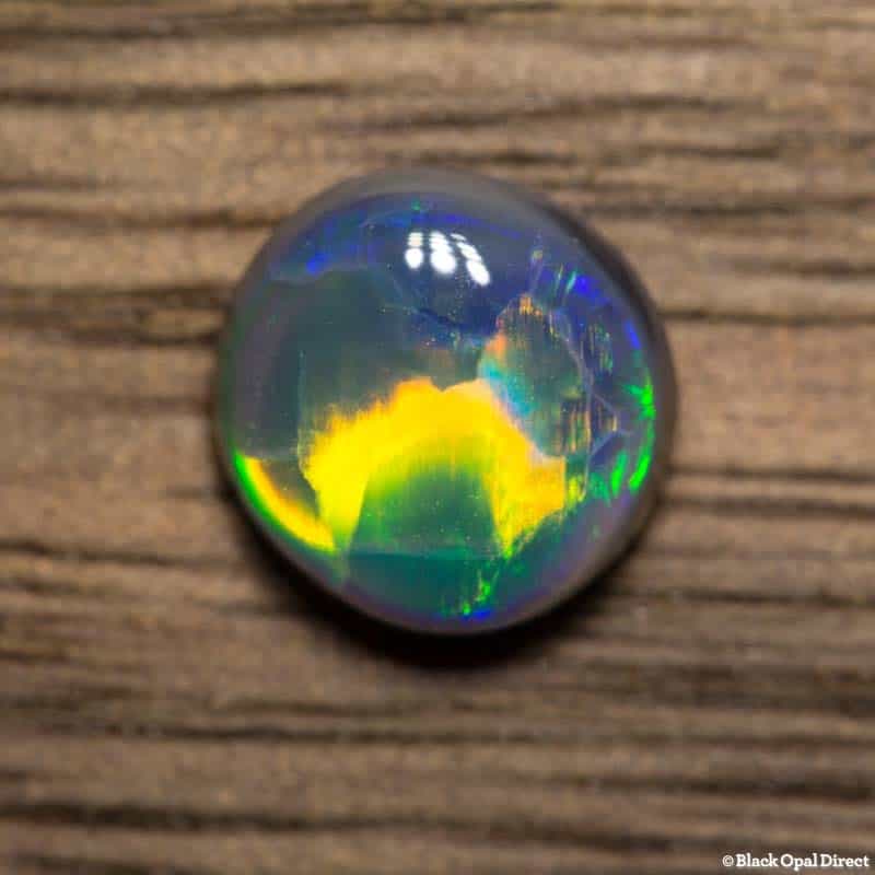 1.04 ct gem black opal 6.5mm round x3mm