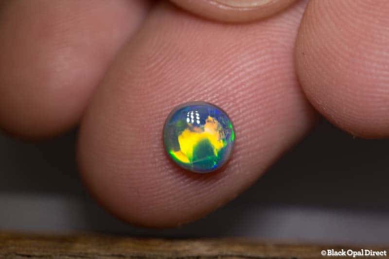 1.04 ct gem black opal 6.5mm round x3mm