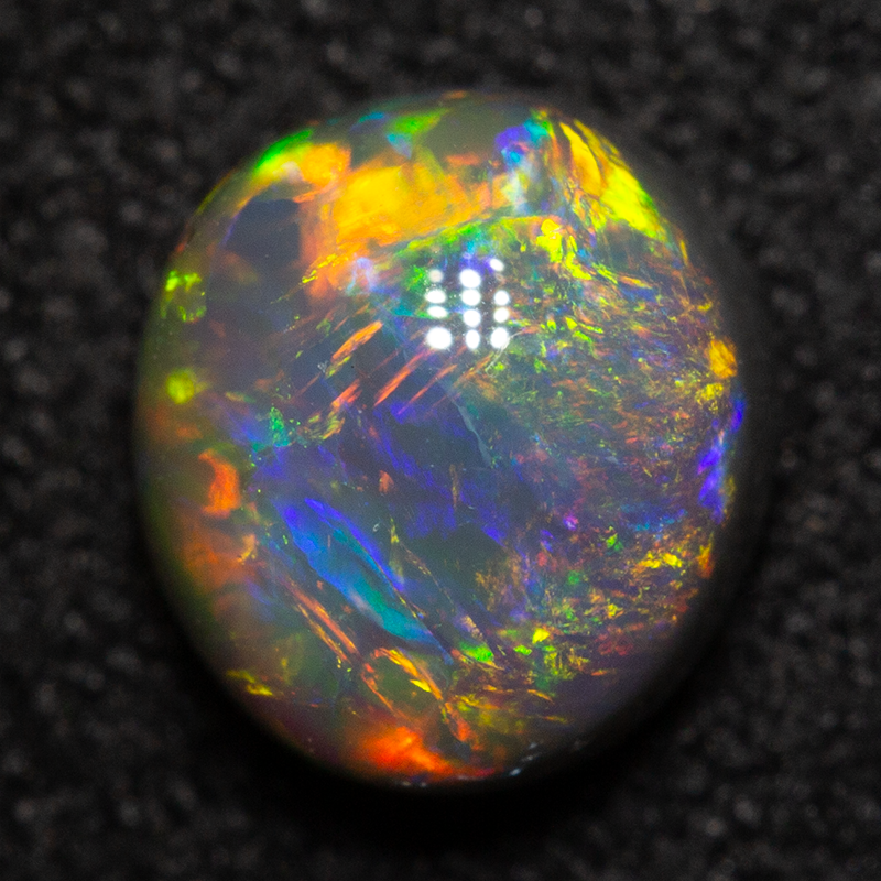 1.05 ct dark opal gem 6.5x6x4mm