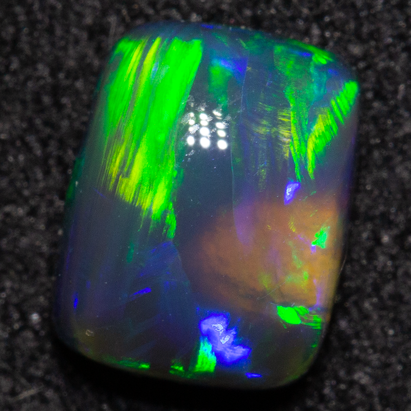 1.05 ct black opal 7x5.5x3.8mm