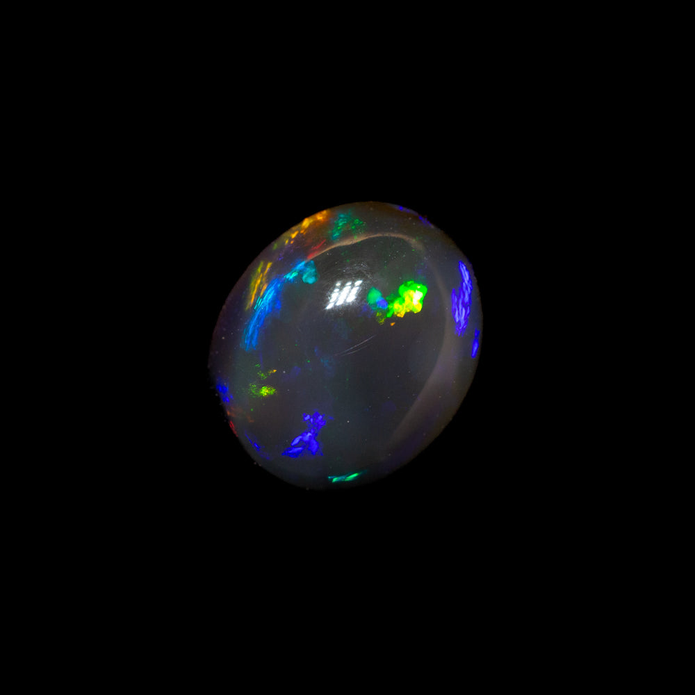 1.05 ct black crystal opal 7.2x6x3.9mm