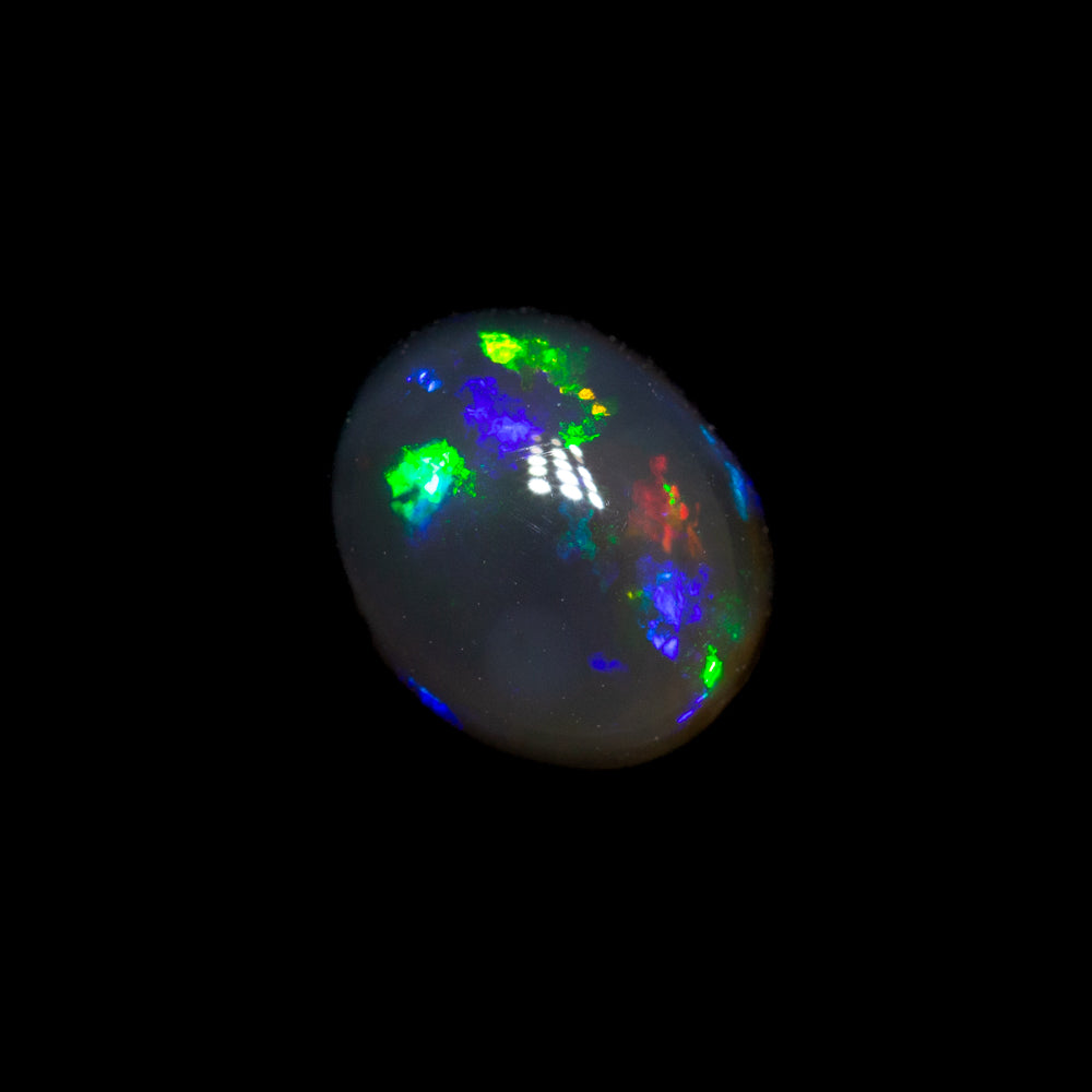 1.05 ct black crystal opal 7.2x6x3.9mm