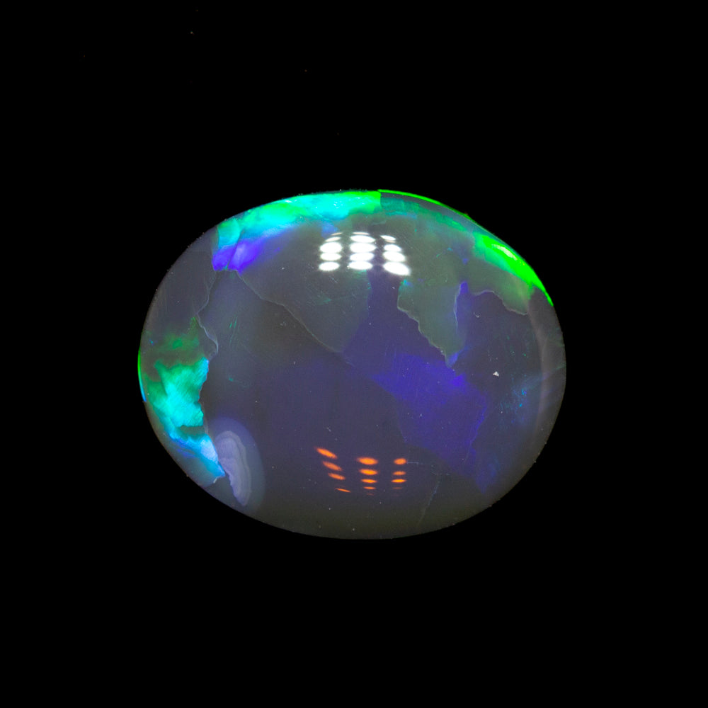 1.07 ct black crystal opal 9.1x7.5x2.4mm