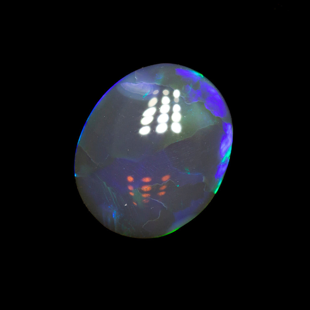 1.07 ct black crystal opal 9.1x7.5x2.4mm