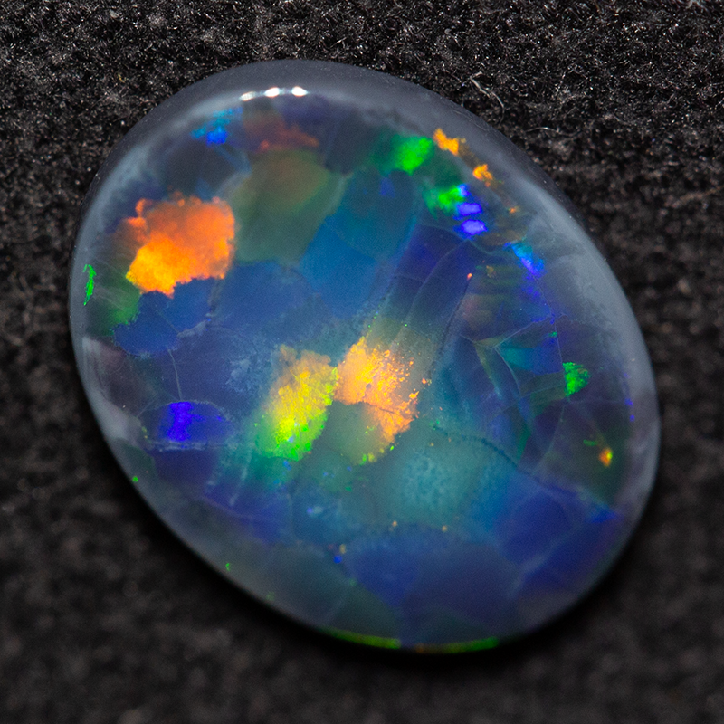 1.08 ct gem black opal 9.8x7.7x2.1mm