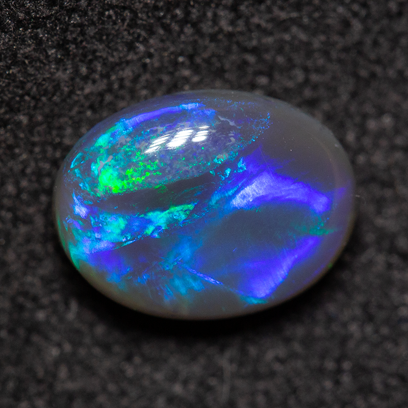 1.09 ct black opal 8.1x6.1x3.3mm