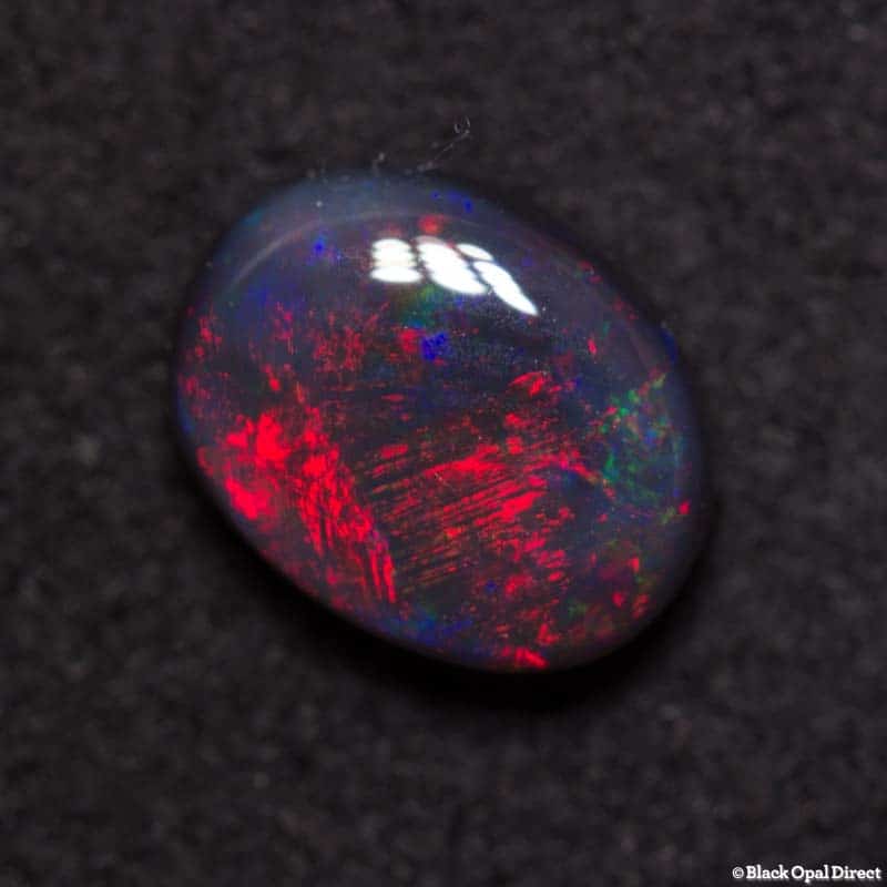 1.09 ct black opal 7.5x6x3mm