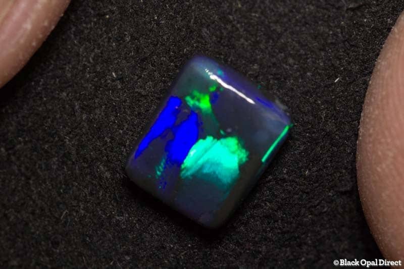 1.09 ct black opal cushion cut 8x6.5x2mm