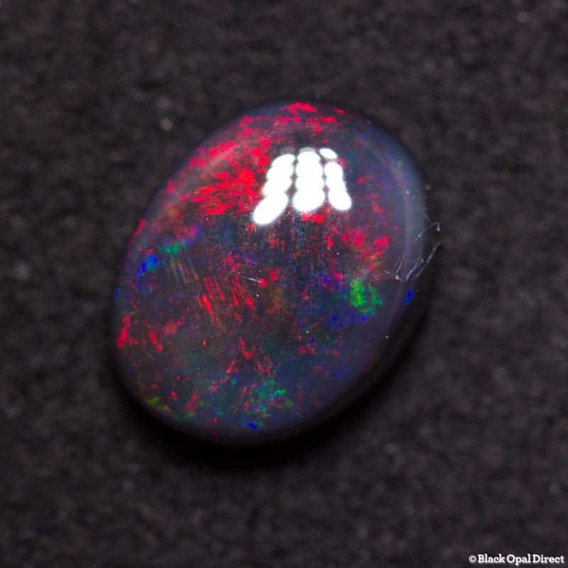 1.09 ct black opal 7.5x6x3mm