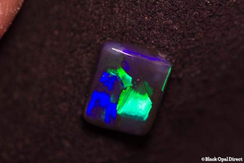 1.09 ct black opal cushion cut 8x6.5x2mm