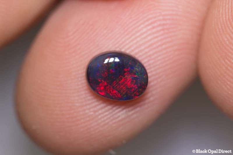 1.09 ct black opal 7.5x6x3mm
