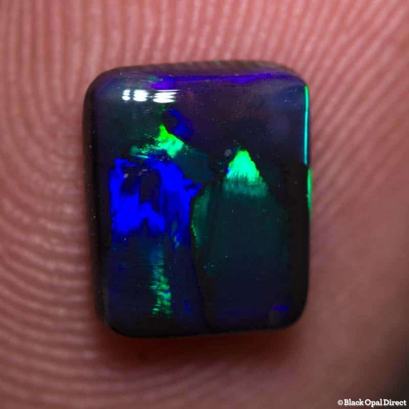 1.09 ct black opal cushion cut 8x6.5x2mm
