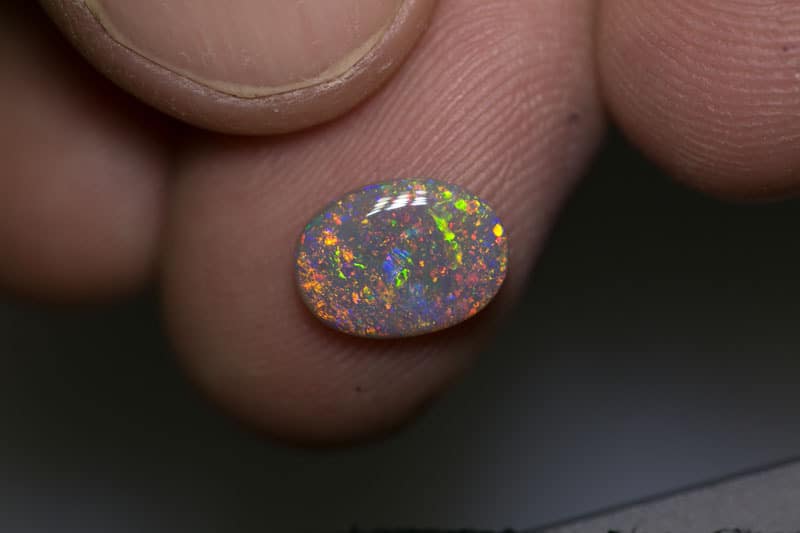 1.10 ct dark opal 10x7x2mm