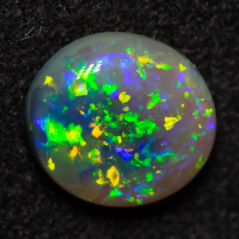 1.15 ct dark opal 7.9x7.1x3.1mm