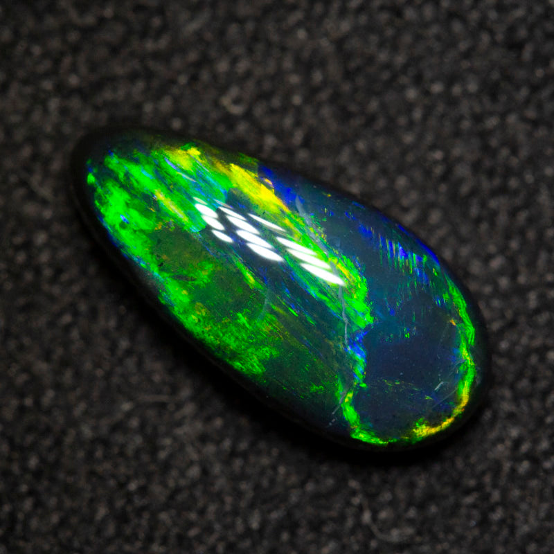 1.12 ct black opal 10.4x5x3.6mm