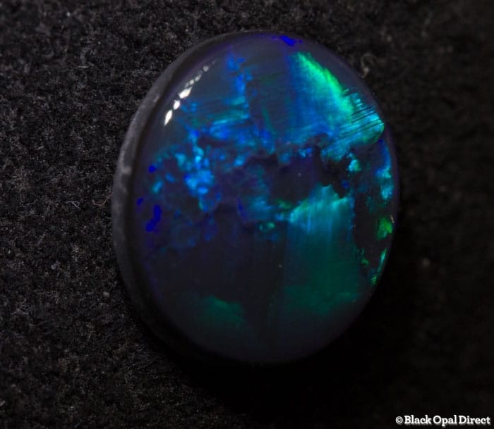 1.12 ct black opal 9x7.5x3.5mm