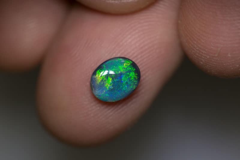 1.12 ct black opal 8x6x3mm