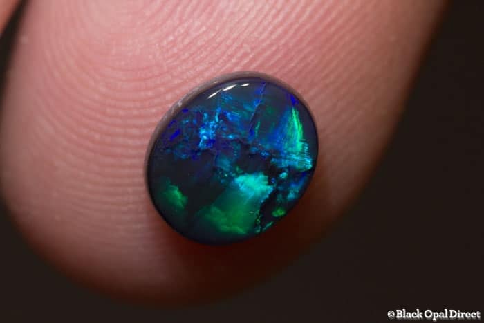 1.12 ct black opal 9x7.5x3.5mm