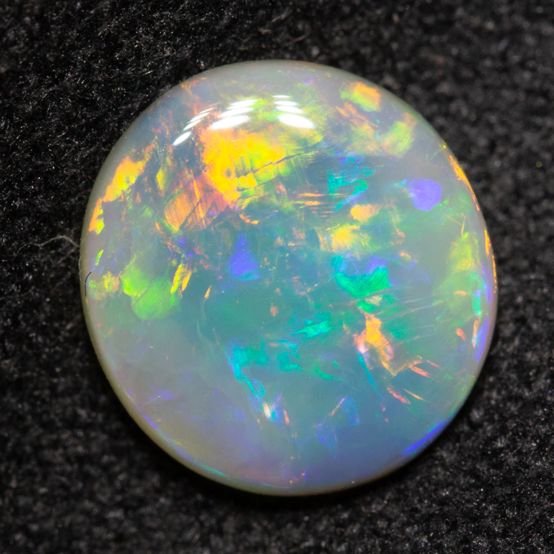 1.13 ct dark opal 8.5x7.8x2.8mm