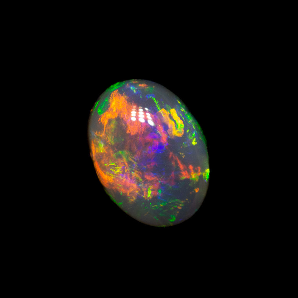 1.13 ct double-sided black opal 7.8x5.8x3.8mm