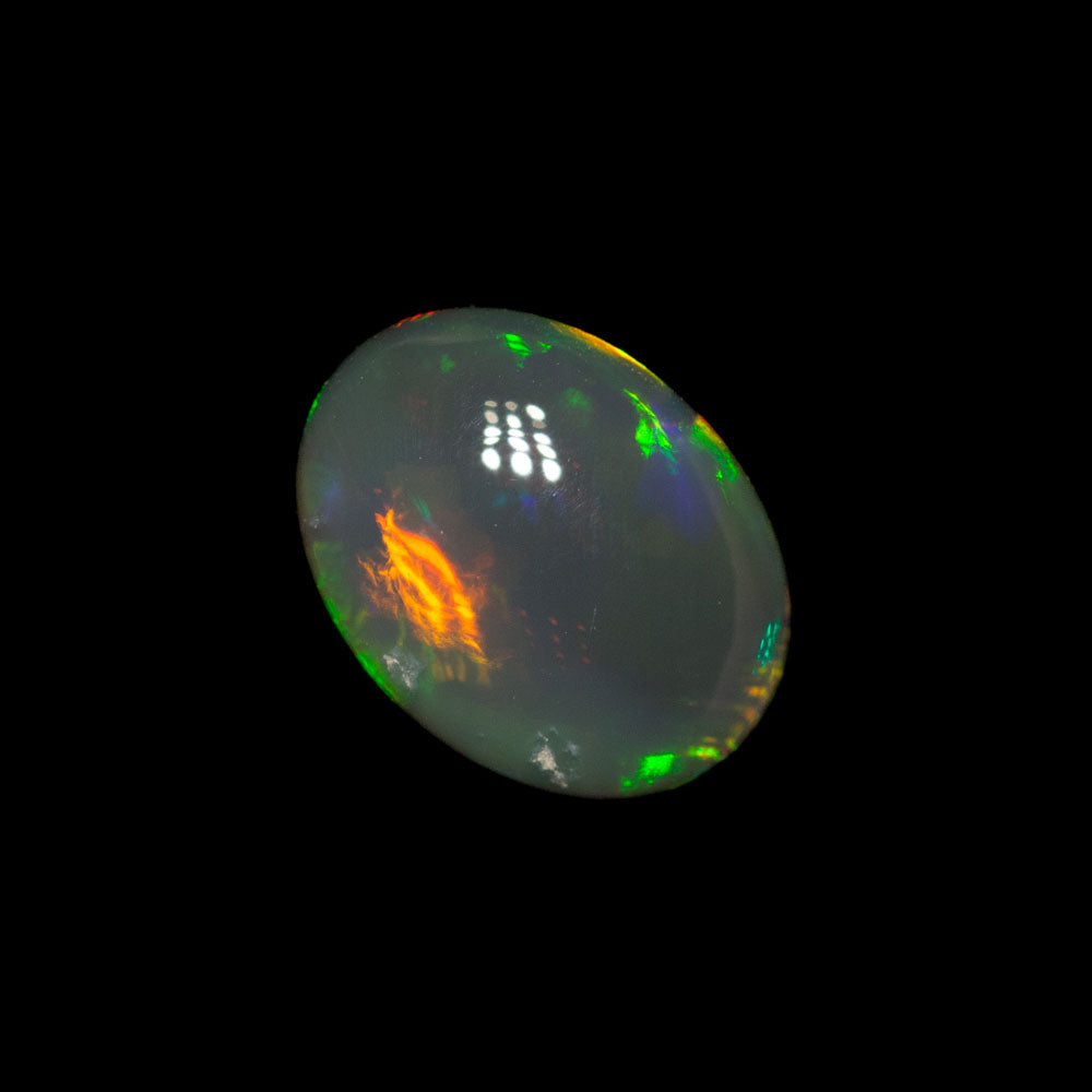 1.13 ct double-sided black opal 7.8x5.8x3.8mm