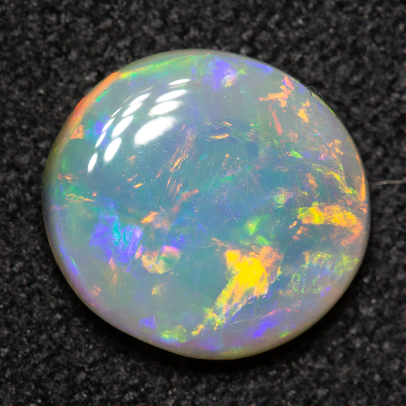1.13 ct dark opal 8.5x7.8x2.8mm