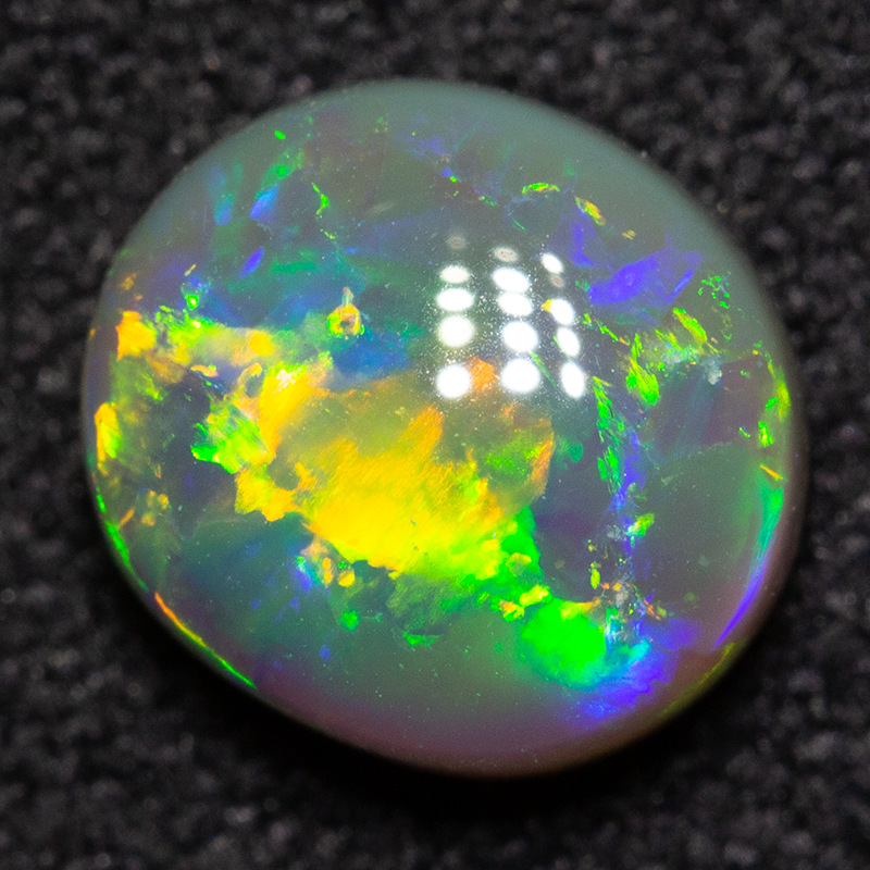 1.15 ct dark opal 7.4x6.6x3.7mm