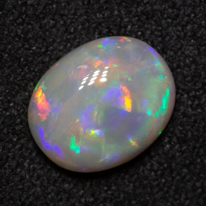 1.15 ct dark opal 8.5x7x3.1mm