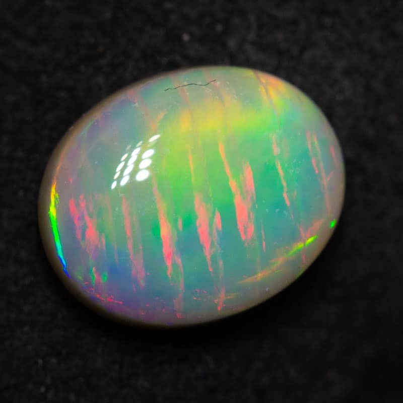 1.17 ct dark fish scale pattern opal 8.3x6.8x3.2mm