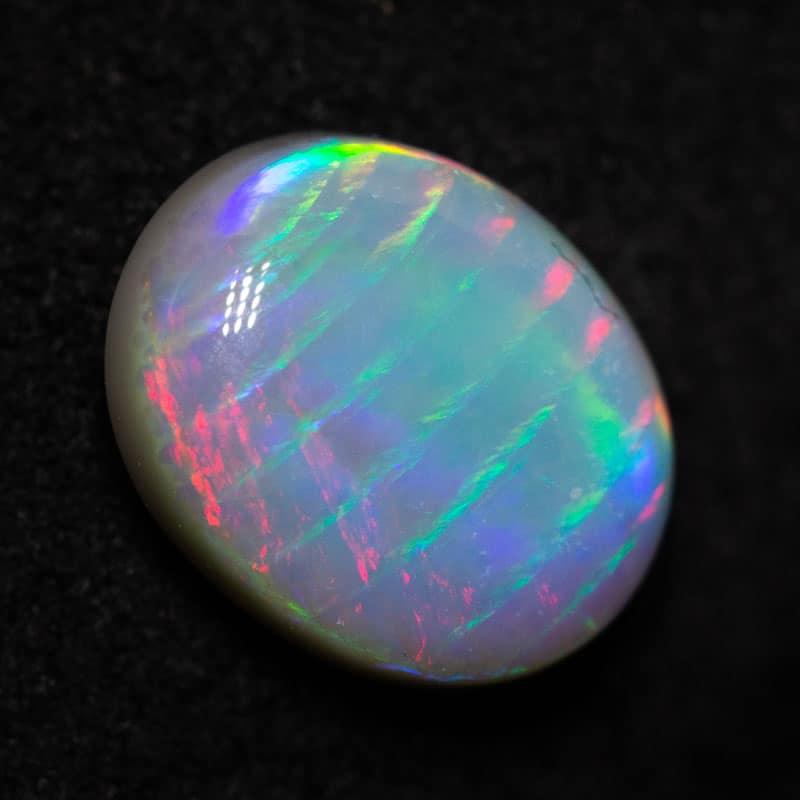 1.17 ct dark fish scale pattern opal 8.3x6.8x3.2mm
