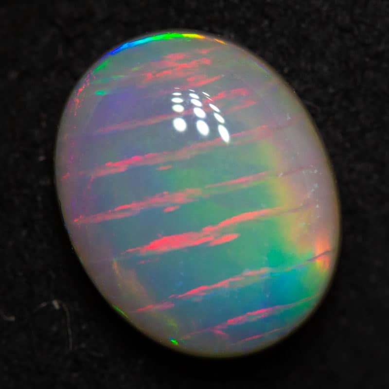 1.17 ct dark fish scale pattern opal 8.3x6.8x3.2mm