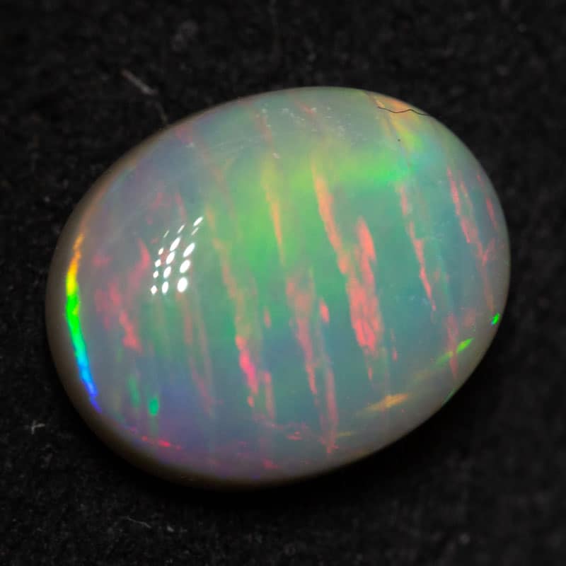 1.17 ct dark fish scale pattern opal 8.3x6.8x3.2mm