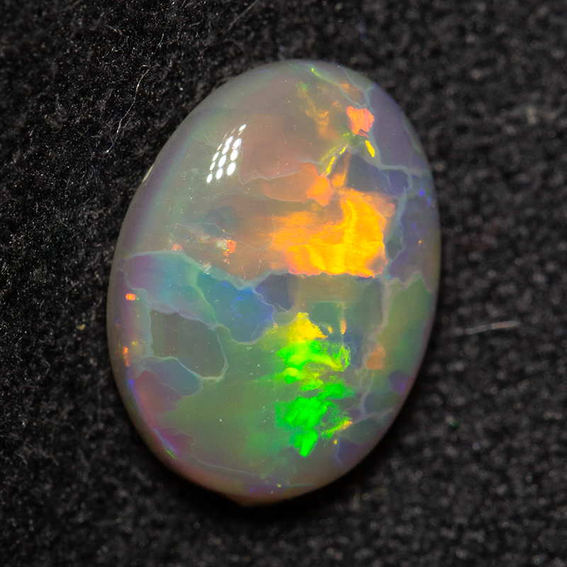 1.19 ct dark opal 9.1x6.7x3.1mm