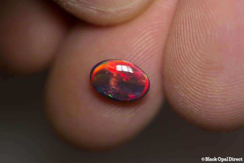 1.19 ct red on black opal gem 9x6x3mm