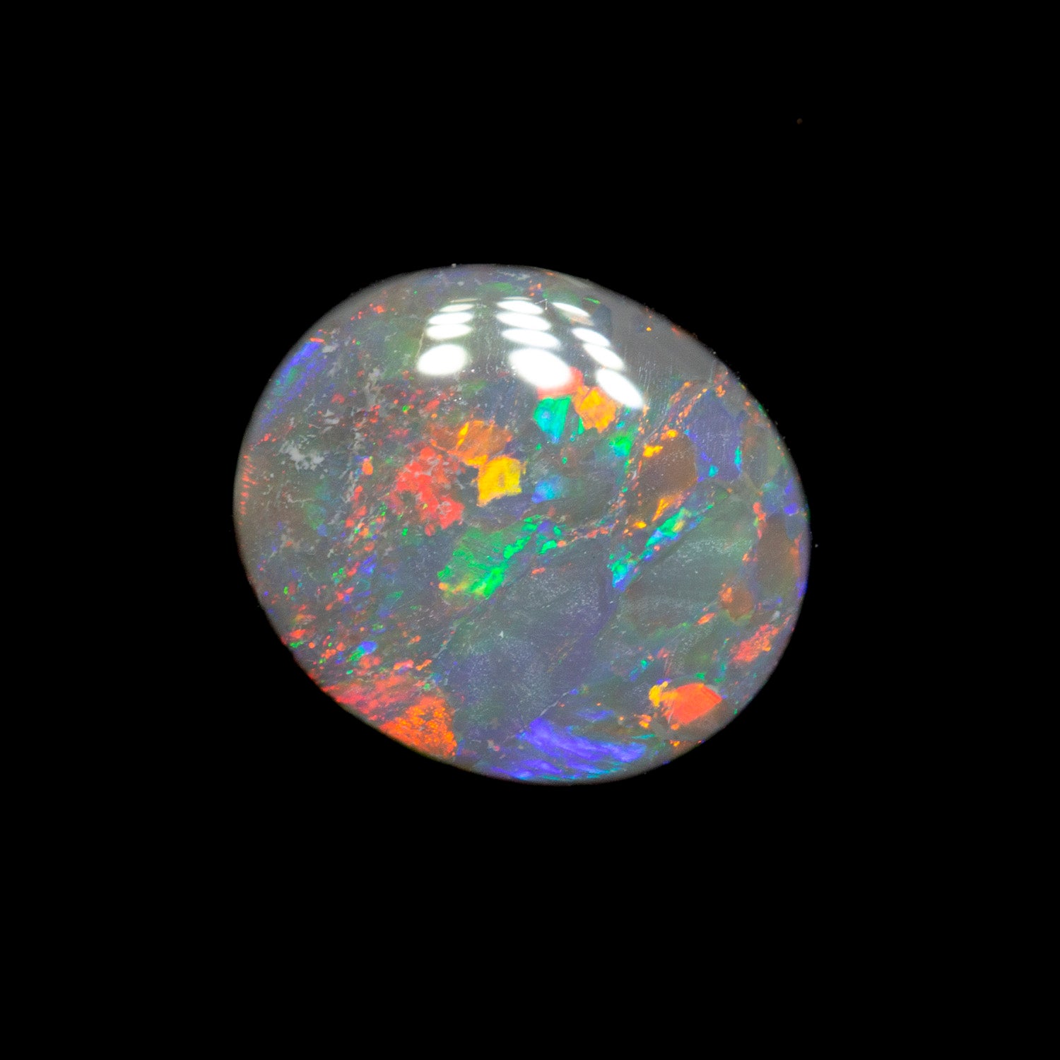 1.21 ct black opal 9x7.7x2.4mm