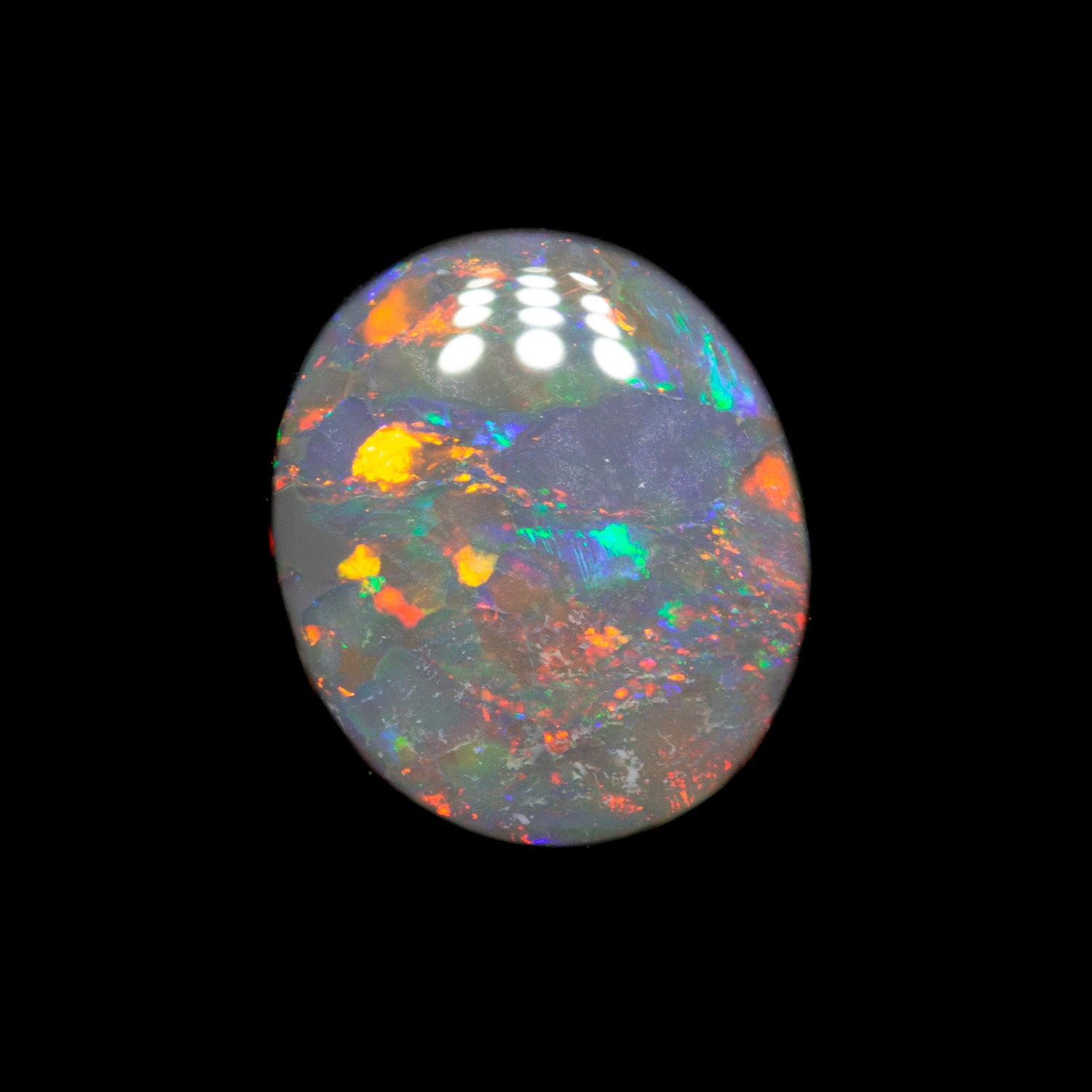 1.21 ct black opal 9x7.7x2.4mm