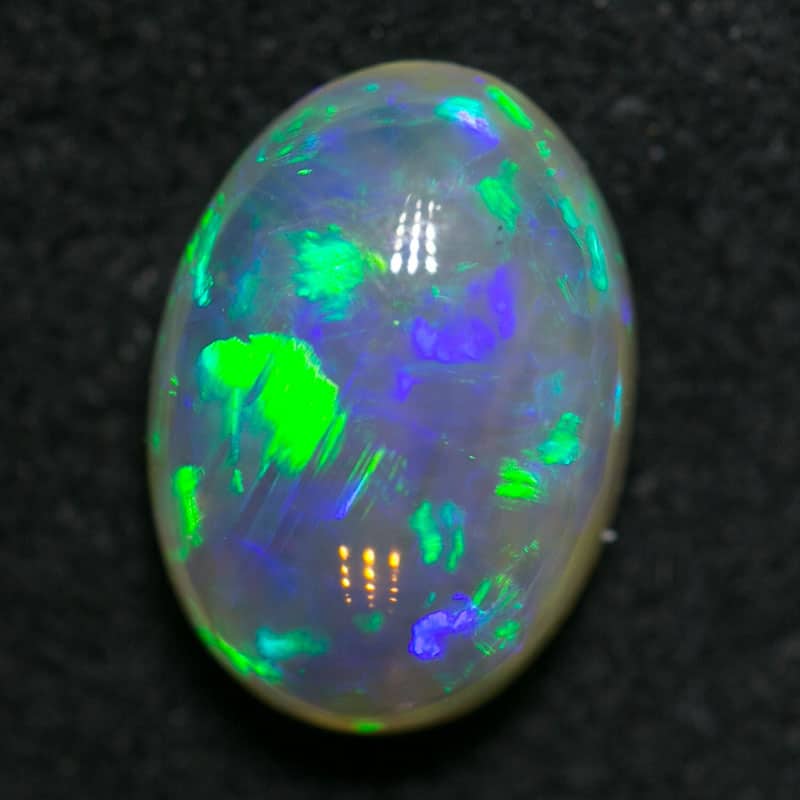 1.23 ct double sided crystal opal 8.5x6x3mm