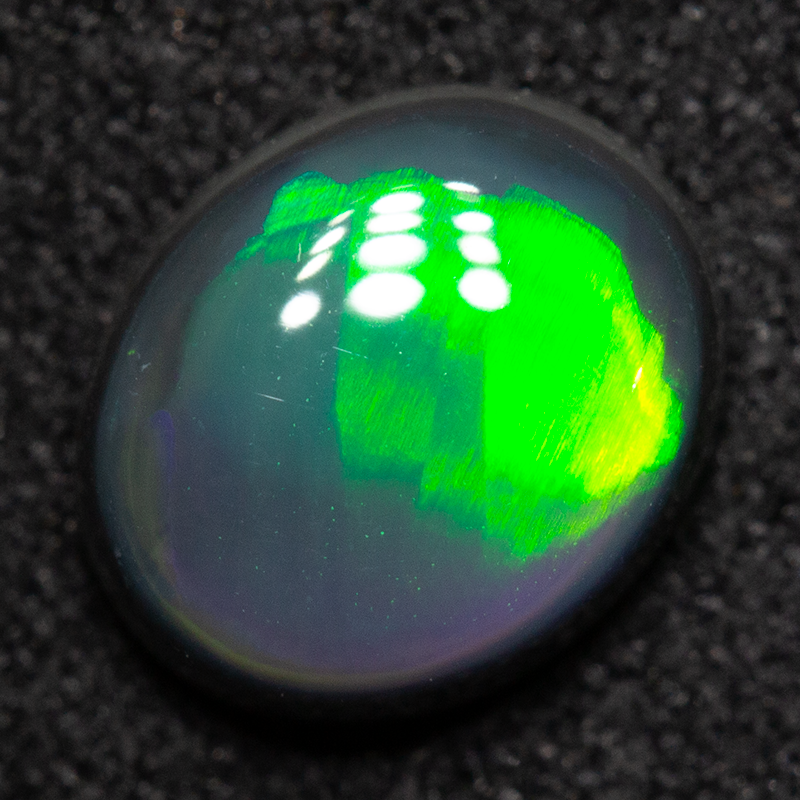 1.24 ct black opal 7.9x6.6x3.6mm