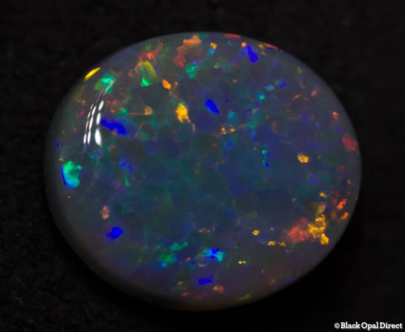 1.24 ct semi black opal 8.5x7.5x3mm