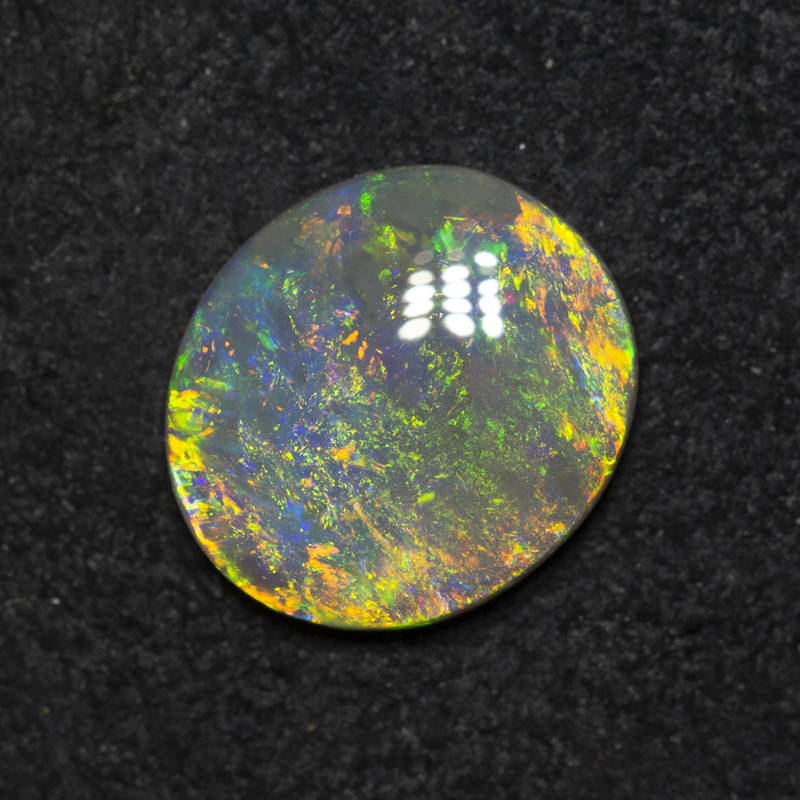 1.25 ct dark opal 9.6x8.5x2.4mm