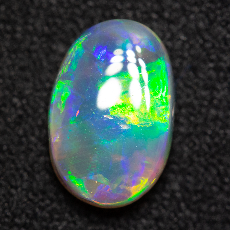 1.25 ct dark opal gem 9x6.5x3mm
