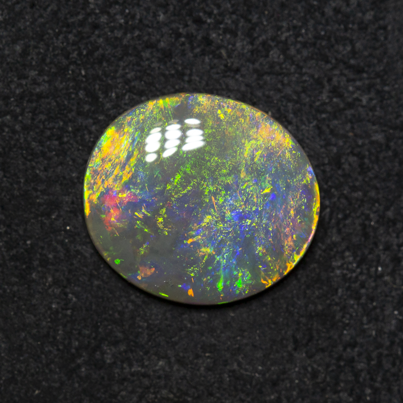 1.25 ct dark opal 9.6x8.5x2.4mm