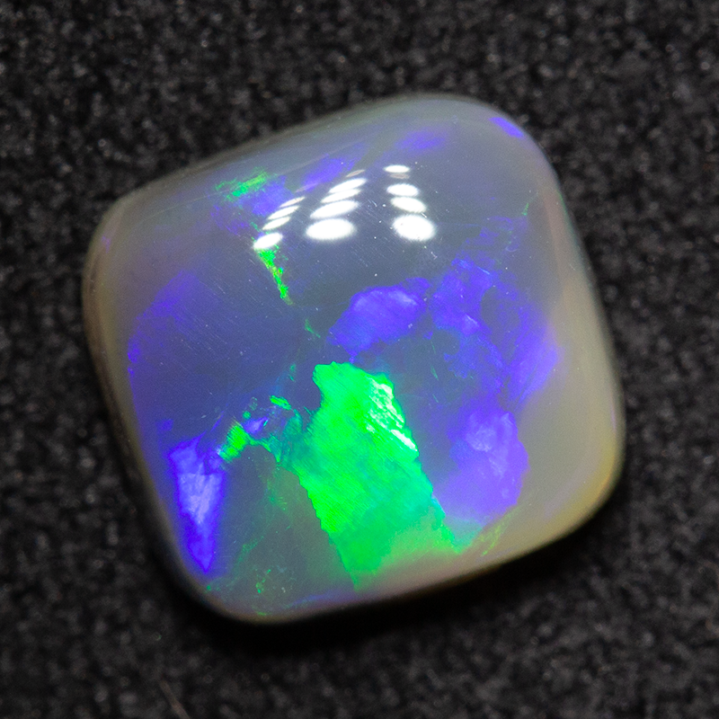1.25 ct dark opal 7.2x7x3.2mm