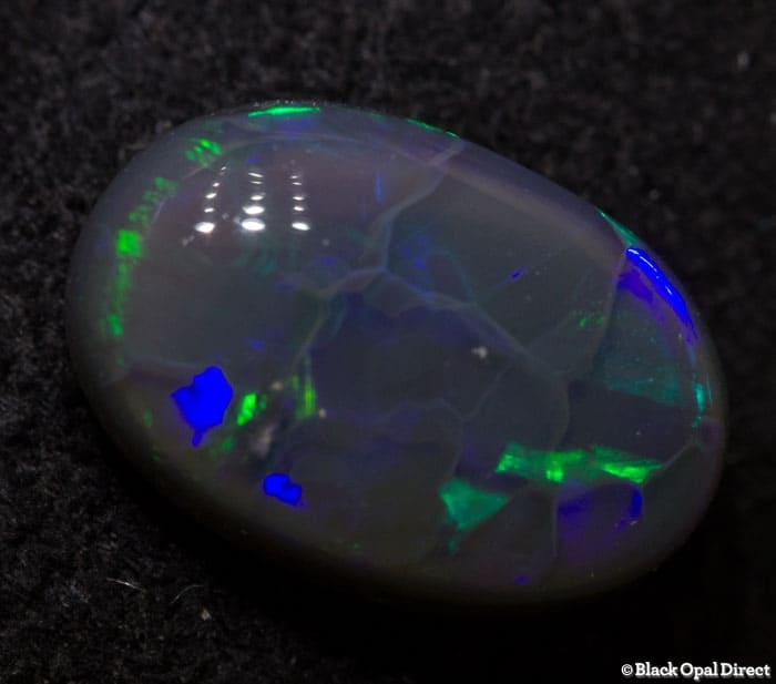 1.25 ct semi black opal 9x6x3mm