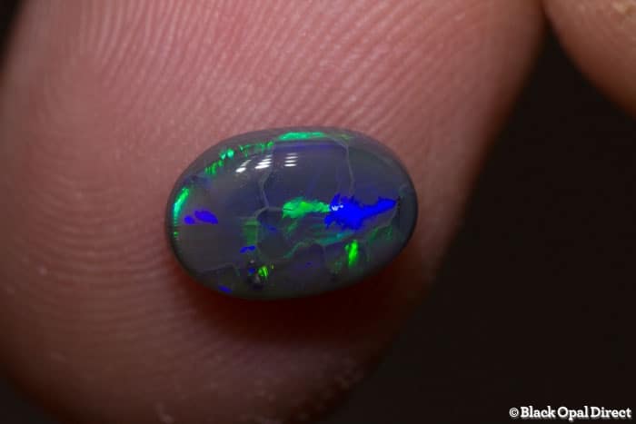 1.25 ct semi black opal 9x6x3mm