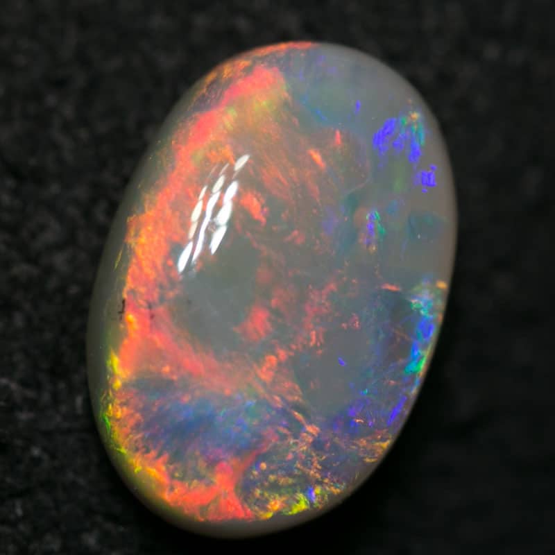 1.26 ct dark opal 9x6x3mm